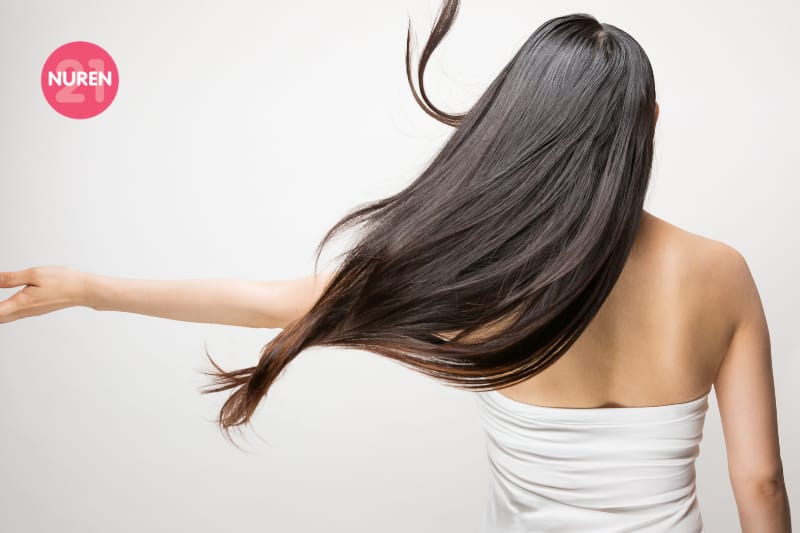 image of woman with long silky hair 